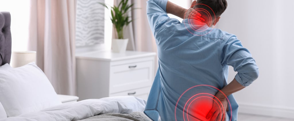 Man,Suffering,From,Back,Pain,After,Sleeping,On,Uncomfortable,Mattress