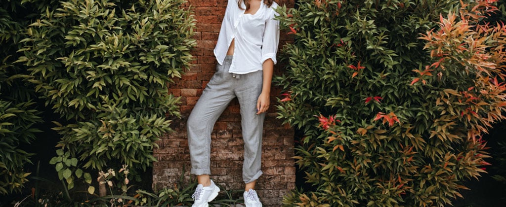 Slim,Lady,In,White,Sneakers,,Gray,Pants,And,White,Oversized